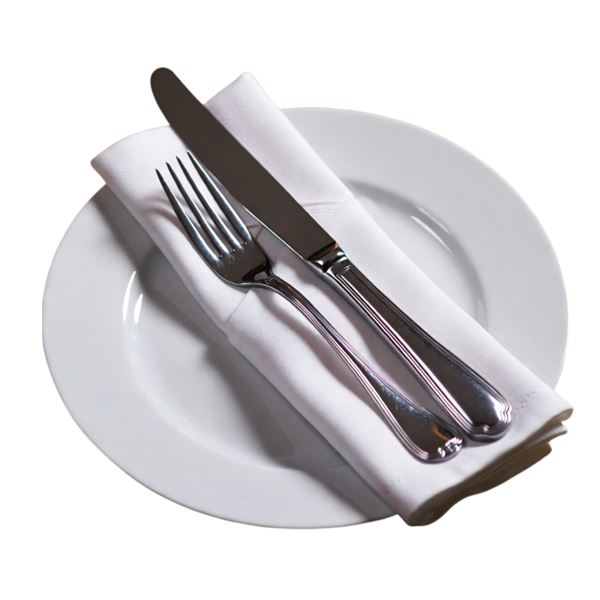 Bord, bestek gerold in een servet Bord, bestek gerold in een servet